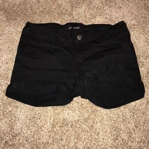 black cuffed short shorts